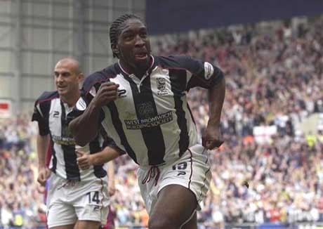 Big Dave celebrates the first goal against Palace in April 2002