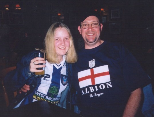 Father and daughter celebrate, although those pints of Banks's have taken their toll on Rebekah!