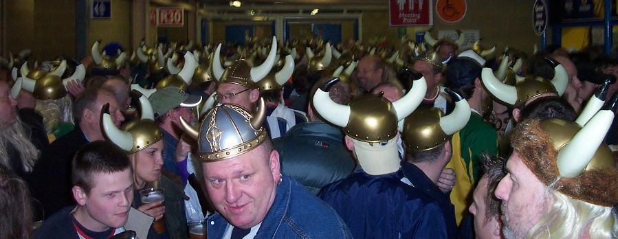 A mass of Vikings under the stand.